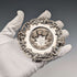 Antique American sterling silver tea strainer with floral decoration