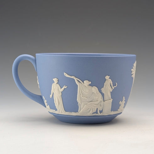 Vintage British Wedgwood Jasperware cup and saucer in pale blue