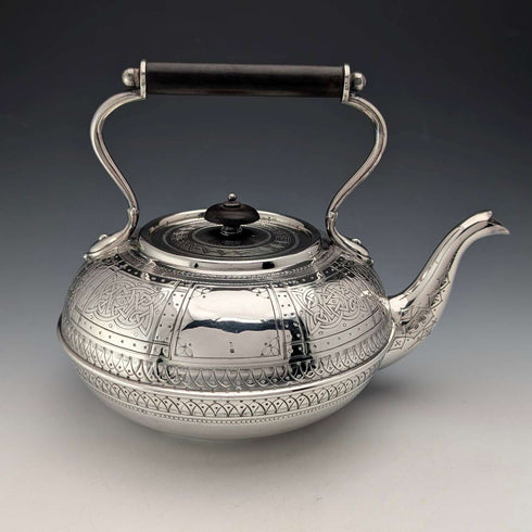 Antique British silver plated tea kettle with Celtic carvings