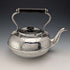 Antique British silver plated tea kettle with Celtic carvings