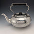 Antique British silver plated tea kettle with Celtic carvings