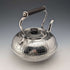 Antique British silver plated tea kettle with Celtic carvings