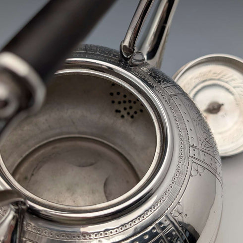 Antique British silver plated tea kettle with Celtic carvings