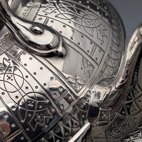 Antique British silver plated tea kettle with Celtic carvings