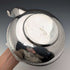 Antique British silver plated tea kettle with Celtic carvings