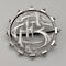 Antique sterling silver monogrammed round brooch