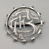 Antique sterling silver monogrammed round brooch