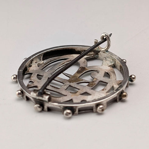 Antique sterling silver monogrammed round brooch