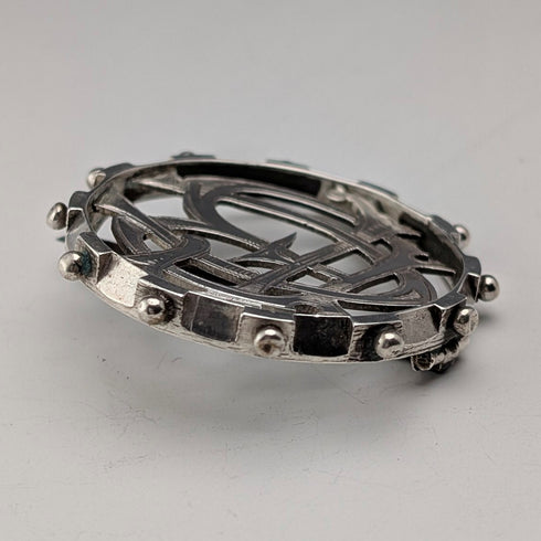Antique sterling silver monogrammed round brooch