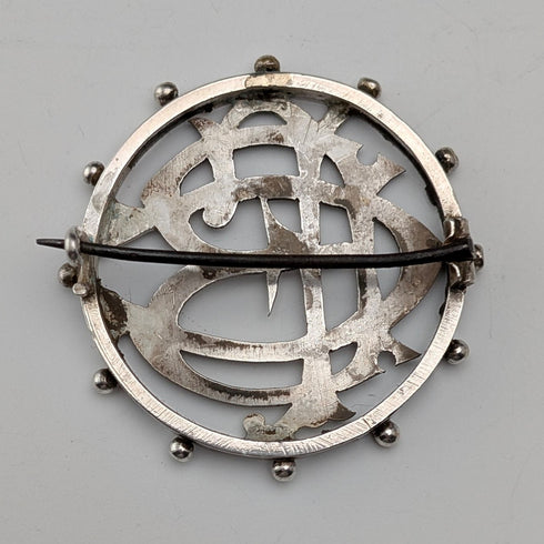 Antique sterling silver monogrammed round brooch
