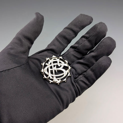 Antique sterling silver monogrammed round brooch