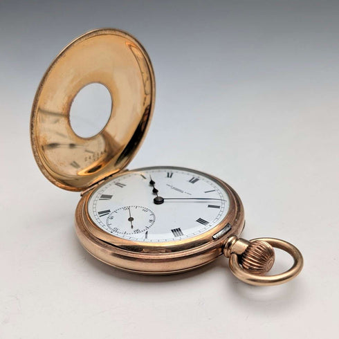 British antique Russell pocket watch, gold plated half hunter case, in good working order