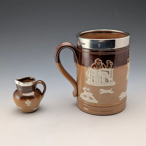 Circa 1900 British antique sterling silver decorated ceramic mug and mini cream jug Mappin & Webb