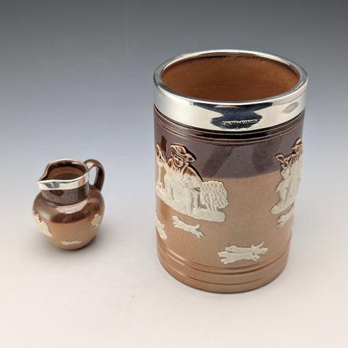 Circa 1900 British antique sterling silver decorated ceramic mug and mini cream jug Mappin & Webb