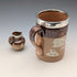 Circa 1900 British antique sterling silver decorated ceramic mug and mini cream jug Mappin & Webb