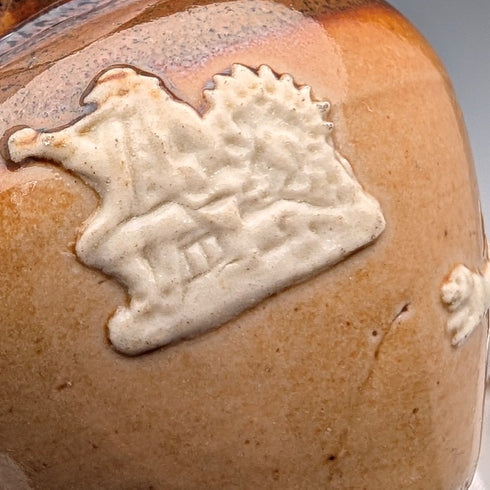 Circa 1900 British antique sterling silver decorated ceramic mug and mini cream jug Mappin & Webb