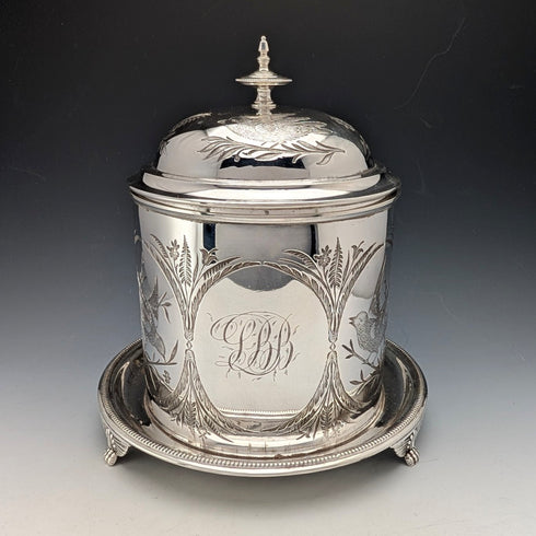 Antique British silver plated biscuit barrel with bird decoration