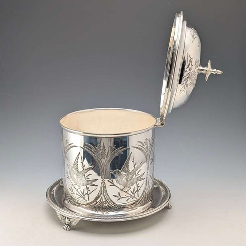 Antique British silver plated biscuit barrel with bird decoration