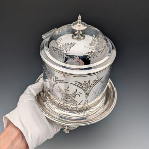Antique British silver plated biscuit barrel with bird decoration