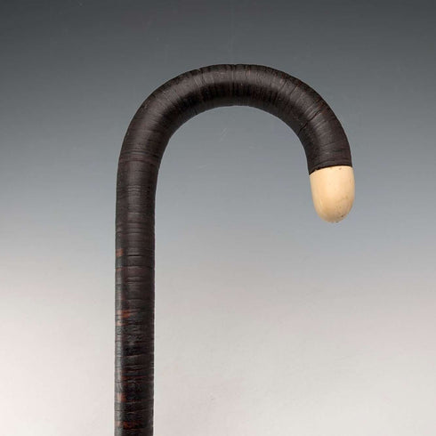 Antique British bone decorated curved handle leather wrapped iron shaft walking stick 89cm