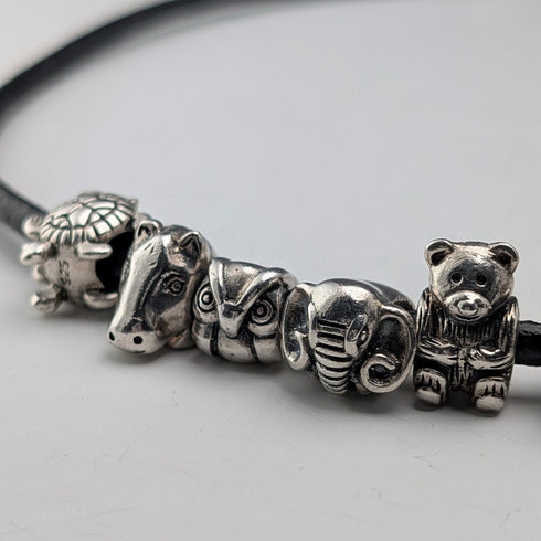 Vintage sterling silver animal beads totaling 56g with leather necklace