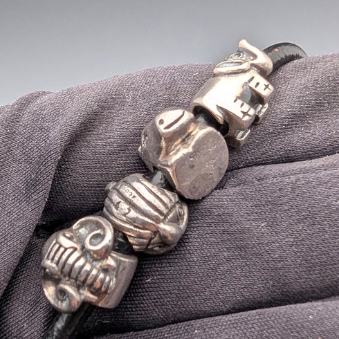 Vintage sterling silver animal beads totaling 56g with leather necklace