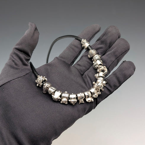 Vintage sterling silver animal beads totaling 56g with leather necklace