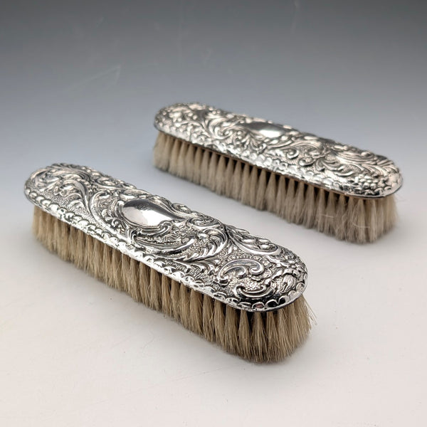 1908 British antique sterling silver decorated handle clothes brush pair J&R Griffin