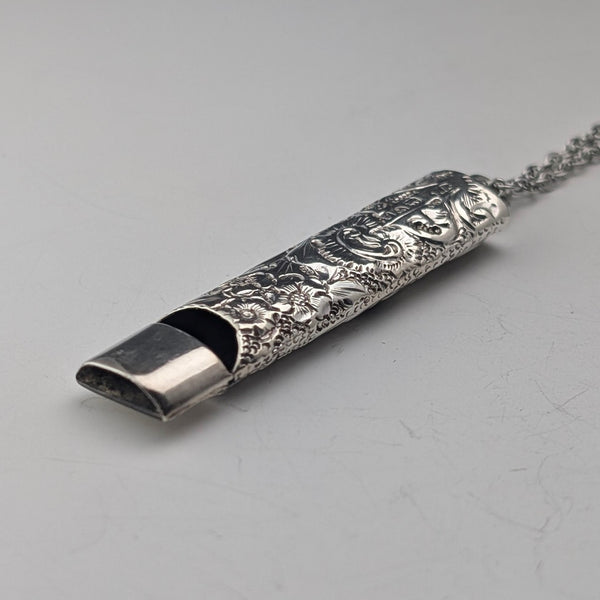 1902 British antique floral decorated sterling silver whistle by William Manton, with chain