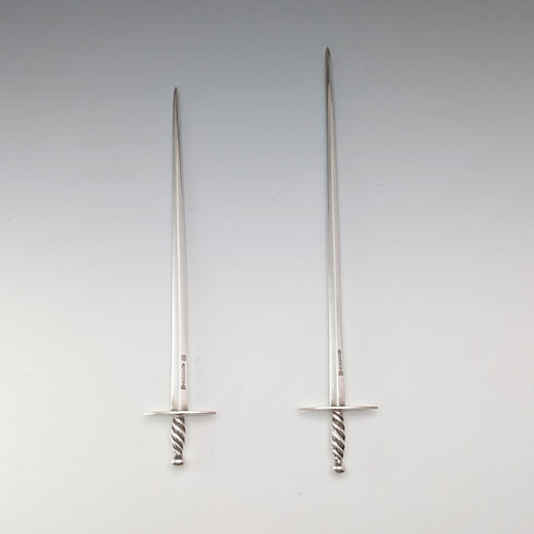 Antique British silver plate sword-shaped meat skewers pair by William Hutton & Sons