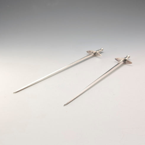 Antique British silver plate sword-shaped meat skewers pair by William Hutton & Sons
