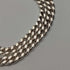 1977 British pure silver jubilee ingot pendant, 28.1g, with pure silver necklace, BGA