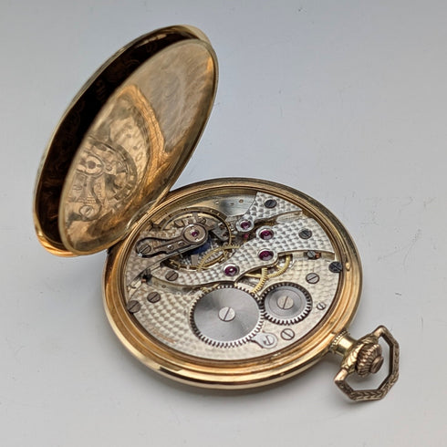 Girard-Perregaux pocket watch, circa 1930, 18K gold, hunter case, good working condition, with leather box.