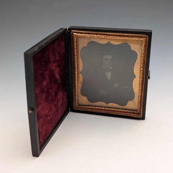 British antique, Ambrotype photograph of a man, housed in a leather case.