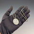 1977, UK, sterling silver, oval pendant with sterling silver necklace, total weight 22.4g