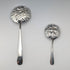 Pair of antique American sterling silver berry spoons, large and small, total weight 111g, S. Kirk & Son.