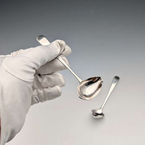 Pair of antique British sterling silver baby feeder spoons, total weight 22g.