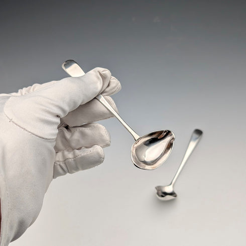 Pair of antique British sterling silver baby feeder spoons, total weight 22g.