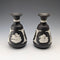 A pair of vintage British Wedgwood black jasperware vases.