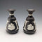 A pair of vintage British Wedgwood black jasperware vases.