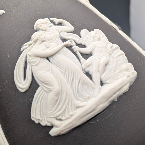 A pair of vintage British Wedgwood black jasperware vases.