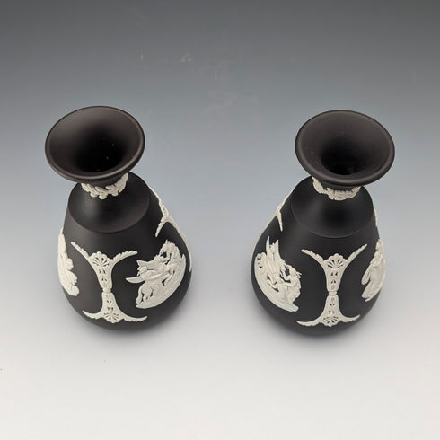 A pair of vintage British Wedgwood black jasperware vases.