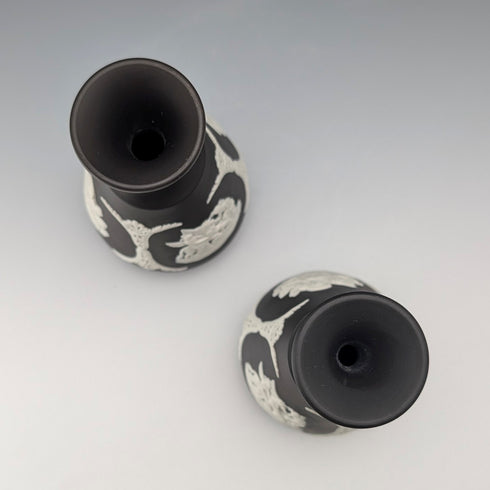 A pair of vintage British Wedgwood black jasperware vases.