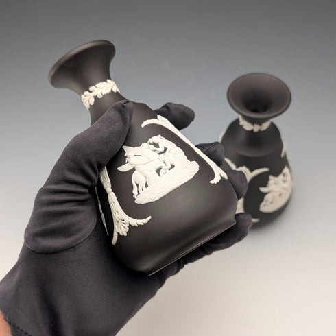 A pair of vintage British Wedgwood black jasperware vases.