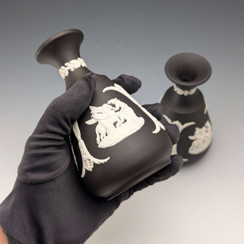 A pair of vintage British Wedgwood black jasperware vases.