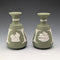 A pair of vintage Wedgwood green jasperware vases.