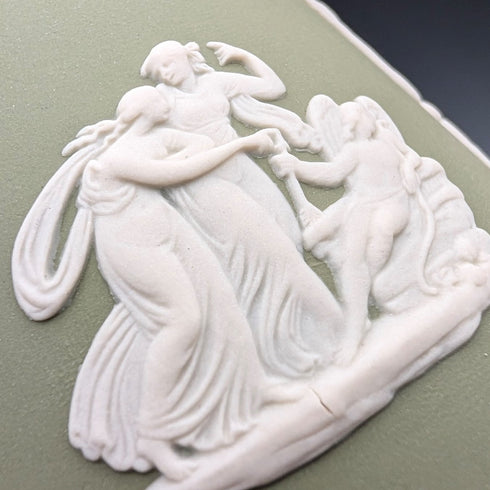 A pair of vintage Wedgwood green jasperware vases.