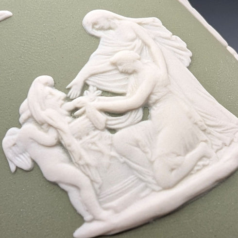 A pair of vintage Wedgwood green jasperware vases.