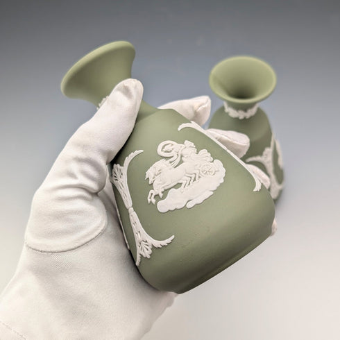 A pair of vintage Wedgwood green jasperware vases.