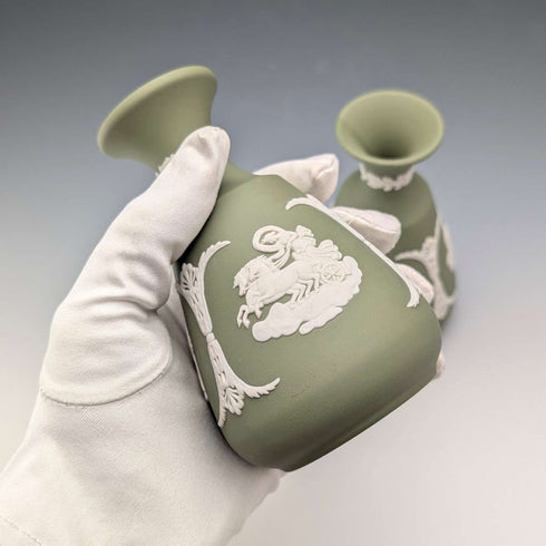 A pair of vintage Wedgwood green jasperware vases.